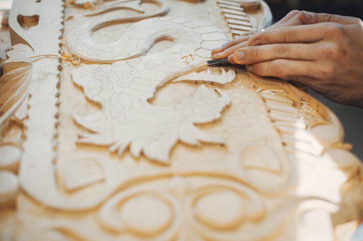 Artisan Indiana limestone carving detail, Tulip Limestone · Precast